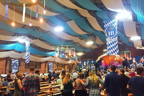 Last night we stopped by Brauhaus Schmitz’s 23rd Street Armory Oktoberfest! Little did we know, we had stepped into a perfect version of the true German festvities. The 16,000 square-foot 23rd Street Armory (22 S. 23rd St.) has been totally transformed into the likeness of a Munich festival tent for the first annual 23rd Street Armory Oktoberfest for October 7-9, 2016. Decked out with Bavarian blue and white ceilings, authentic festival tables and benches imported from Germany plus a lofted stage area for musical acts like the Grammy-nominated Alex Meixner Band. Traditional food provided by Chef Jeremy Nolen and beer will be provided by the famous Hofbräuhaus will be served.