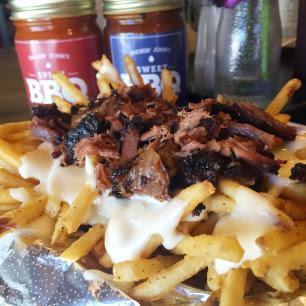 The not-to-be-missed dish here is most definitely the Brisket Burnt End Cheese Fries. Offered with sweet potato or shoestring fries, this dish is decadent and delicious. How could you ever go wrong with gooey cheese sauce and smokey brisket meat?!
